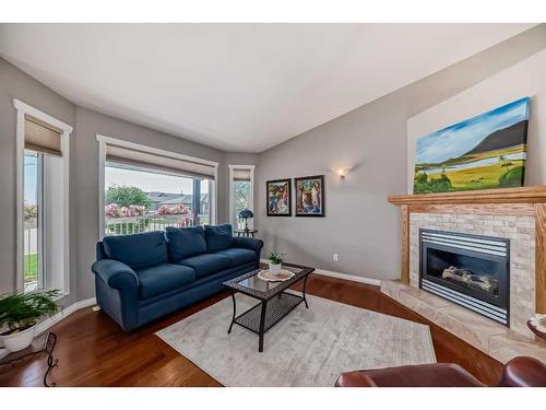 526 Carriage Lane Drive, Carstairs, AB - Indoor Photo Showing Living Room With Fireplace