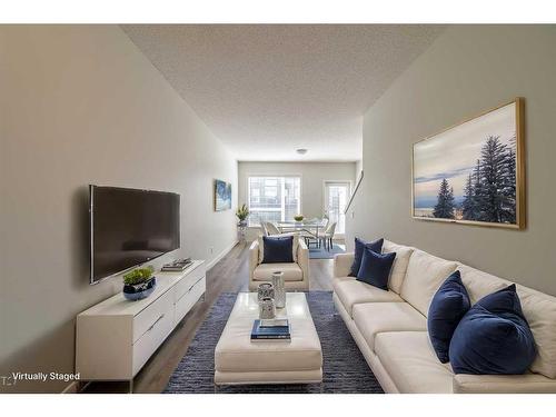 508-16 Evanscrest Park Nw, Calgary, AB - Indoor Photo Showing Living Room