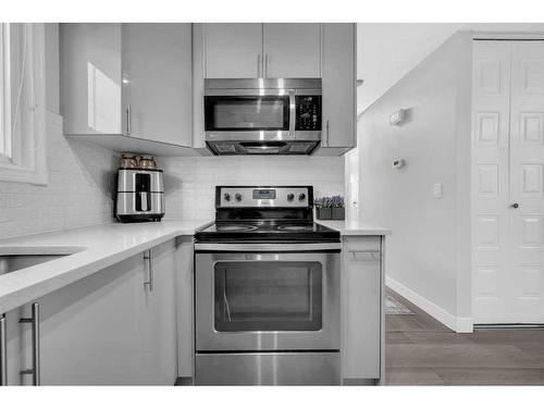 23 Abergale Place Ne, Calgary, AB - Indoor Photo Showing Kitchen With Upgraded Kitchen