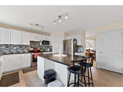 51 Saddlecrest Gardens Ne, Calgary, AB - Indoor Photo Showing Kitchen With Upgraded Kitchen