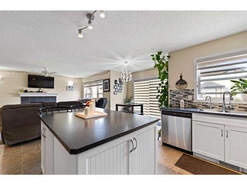 51 Saddlecrest Gardens Ne, Calgary, AB - Indoor Photo Showing Kitchen With Double Sink