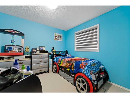 51 Saddlecrest Gardens Ne, Calgary, AB - Indoor Photo Showing Bedroom