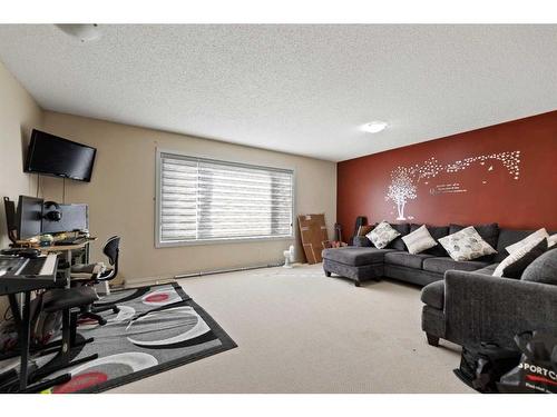 51 Saddlecrest Gardens Ne, Calgary, AB - Indoor Photo Showing Other Room