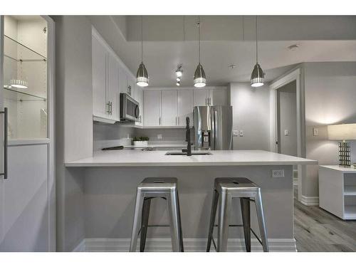 606-836 15 Avenue Sw, Calgary, AB - Indoor Photo Showing Kitchen With Stainless Steel Kitchen With Upgraded Kitchen