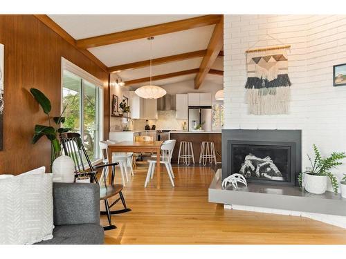 80 Cromwell Avenue Nw, Calgary, AB - Indoor Photo Showing Living Room With Fireplace