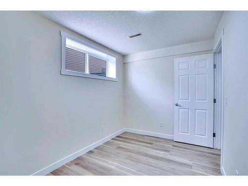 7746 Laguna Way Ne, Calgary, AB - Indoor Photo Showing Other Room