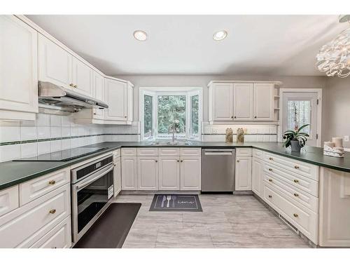 9616 Palisan Place Sw, Calgary, AB - Indoor Photo Showing Kitchen