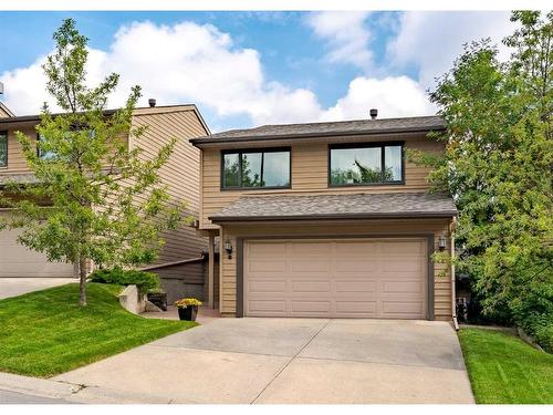 8 Coach Manor Rise Sw, Calgary, AB - Outdoor