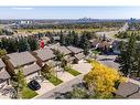 8 Coach Manor Rise Sw, Calgary, AB  - Outdoor With View 