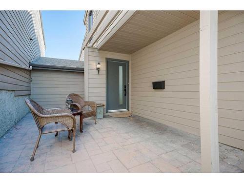 8 Coach Manor Rise Sw, Calgary, AB - Outdoor With Deck Patio Veranda With Exterior