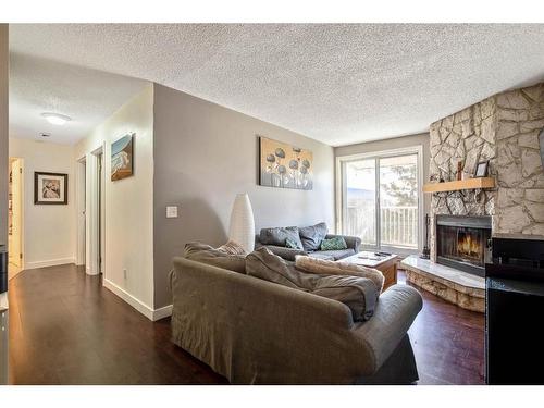 404-1919 17 Avenue Sw, Calgary, AB - Indoor Photo Showing Living Room With Fireplace