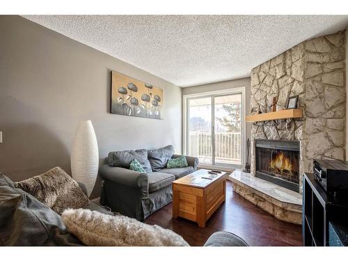 404-1919 17 Avenue Sw, Calgary, AB - Indoor Photo Showing Living Room With Fireplace