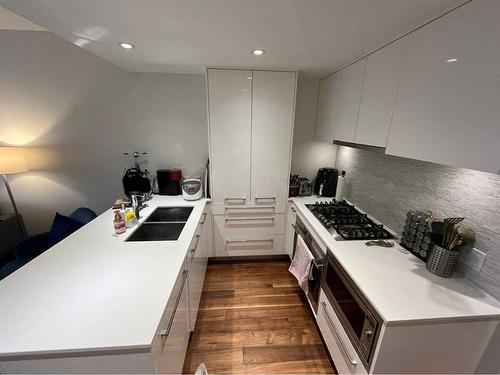 610-1025 5 Avenue Sw, Calgary, AB - Indoor Photo Showing Kitchen With Double Sink With Upgraded Kitchen