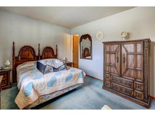 6 Radcliffe Crescent Se, Calgary, AB - Indoor Photo Showing Bedroom