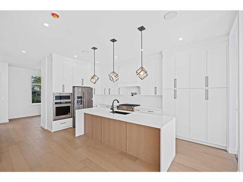 413 18 Avenue Nw, Calgary, AB - Indoor Photo Showing Kitchen With Upgraded Kitchen