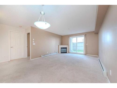 4111-4975 130 Avenue Se, Calgary, AB - Indoor With Fireplace