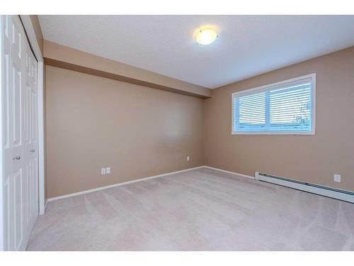 4111-4975 130 Avenue Se, Calgary, AB - Indoor Photo Showing Other Room