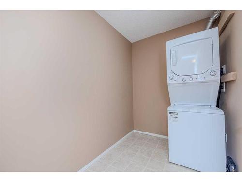 4111-4975 130 Avenue Se, Calgary, AB - Indoor Photo Showing Laundry Room