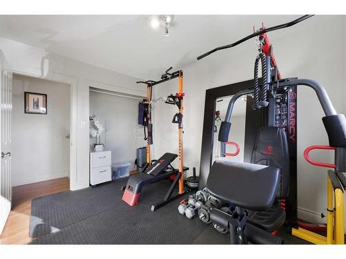 12 Harmon Place Sw, Calgary, AB - Indoor Photo Showing Gym Room