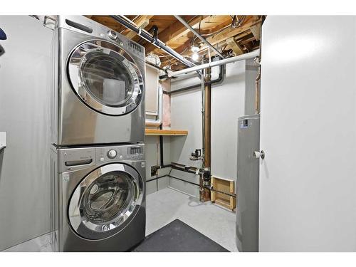 12 Harmon Place Sw, Calgary, AB - Indoor Photo Showing Laundry Room