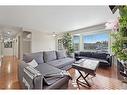 12 Harmon Place Sw, Calgary, AB  - Indoor Photo Showing Living Room 