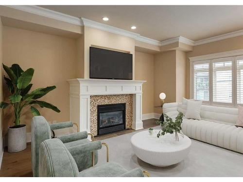 1-420 8 Street Nw, Calgary, AB - Indoor Photo Showing Living Room With Fireplace