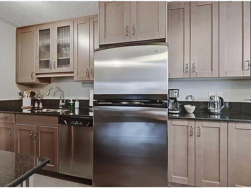 1004-733 14 Avenue Sw, Calgary, AB - Indoor Photo Showing Kitchen With Stainless Steel Kitchen With Double Sink