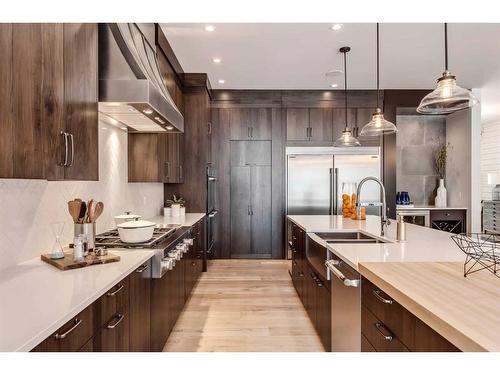 2005 48 Avenue Sw, Calgary, AB - Indoor Photo Showing Kitchen With Double Sink With Upgraded Kitchen