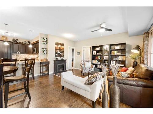 3112-4 Kingsland Close Se, Airdrie, AB - Indoor Photo Showing Living Room With Fireplace