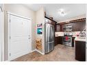 3112-4 Kingsland Close Se, Airdrie, AB  - Indoor Photo Showing Kitchen With Stainless Steel Kitchen 