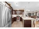 3112-4 Kingsland Close Se, Airdrie, AB  - Indoor Photo Showing Kitchen With Stainless Steel Kitchen With Double Sink With Upgraded Kitchen 