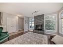 11 Templeson Way Ne, Calgary, AB  - Indoor Photo Showing Living Room With Fireplace 