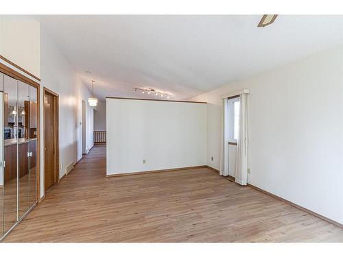 3908 14 Avenue Ne, Calgary, AB - Indoor Photo Showing Other Room With Fireplace