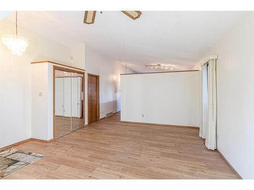 3908 14 Avenue Ne, Calgary, AB - Indoor Photo Showing Living Room With Fireplace