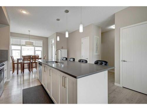 207 New Brighton Walk Se, Calgary, AB - Indoor Photo Showing Kitchen With Upgraded Kitchen