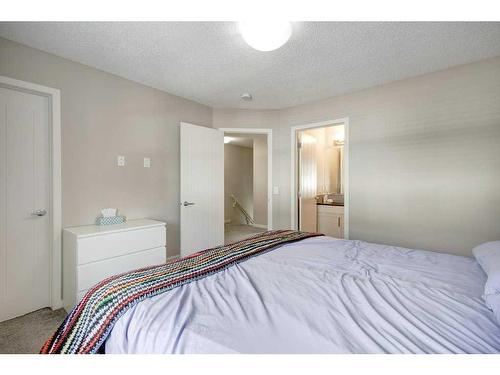 207 New Brighton Walk Se, Calgary, AB - Indoor Photo Showing Bedroom