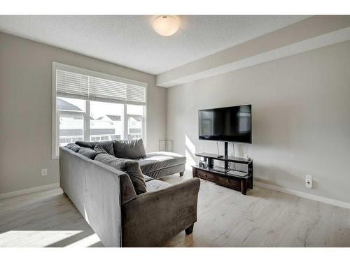 207 New Brighton Walk Se, Calgary, AB - Indoor Photo Showing Living Room