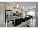 207 New Brighton Walk Se, Calgary, AB  - Indoor Photo Showing Living Room 