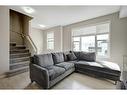 207 New Brighton Walk Se, Calgary, AB  - Indoor Photo Showing Living Room 