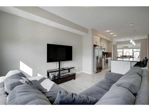 207 New Brighton Walk Se, Calgary, AB - Indoor Photo Showing Living Room