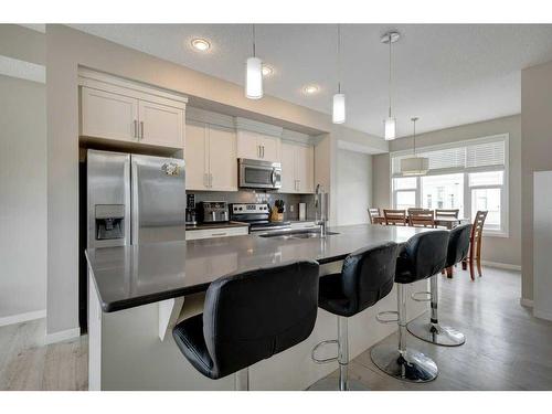 207 New Brighton Walk Se, Calgary, AB - Indoor Photo Showing Kitchen With Stainless Steel Kitchen With Upgraded Kitchen