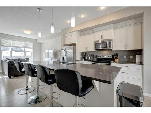 207 New Brighton Walk Se, Calgary, AB - Indoor Photo Showing Kitchen With Stainless Steel Kitchen With Upgraded Kitchen