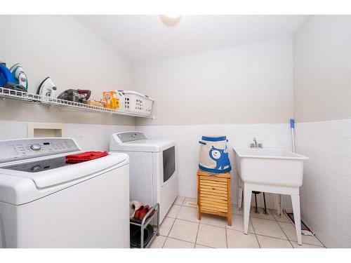 18 Valley Crest Close Nw, Calgary, AB - Indoor Photo Showing Laundry Room