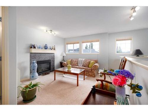 18 Valley Crest Close Nw, Calgary, AB - Indoor Photo Showing Living Room With Fireplace