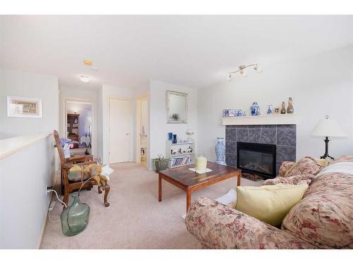 18 Valley Crest Close Nw, Calgary, AB - Indoor Photo Showing Living Room With Fireplace