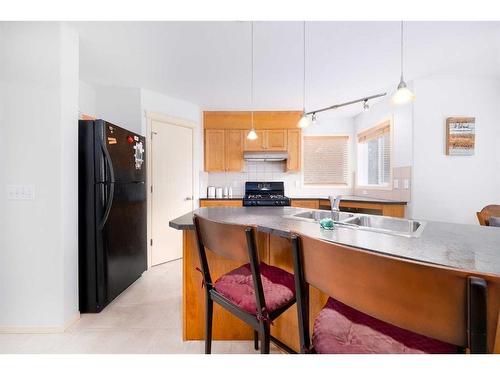 18 Valley Crest Close Nw, Calgary, AB - Indoor Photo Showing Kitchen With Double Sink