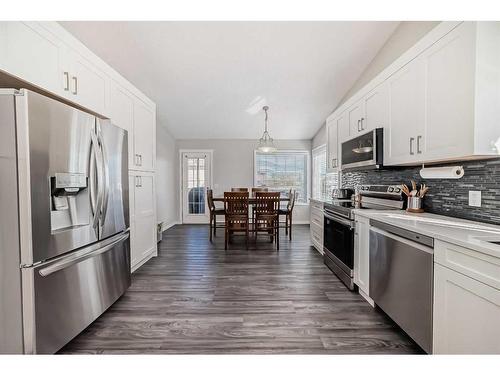 134 Bow Ridge Court, Cochrane, AB - Indoor Photo Showing Kitchen With Stainless Steel Kitchen