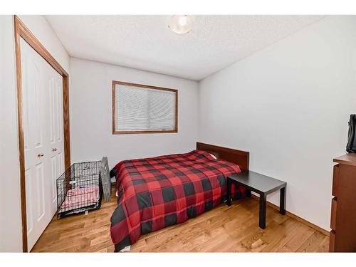 134 Bow Ridge Court, Cochrane, AB - Indoor Photo Showing Bedroom