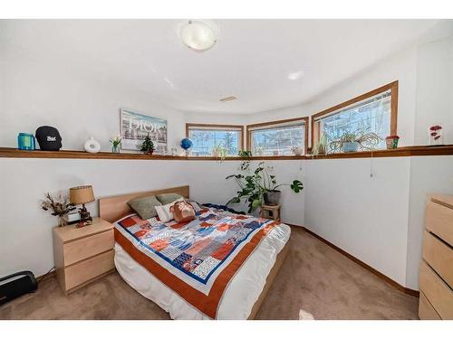 134 Bow Ridge Court, Cochrane, AB - Indoor Photo Showing Bedroom