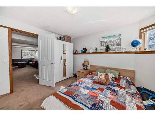 134 Bow Ridge Court, Cochrane, AB - Indoor Photo Showing Bedroom